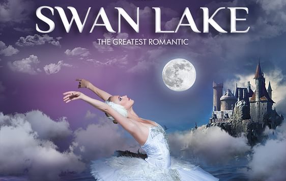 A ballerina in a white dress surrounded by clouds and water with a castle in the distance. Swan Lake is written in large white writing at the top of the image.