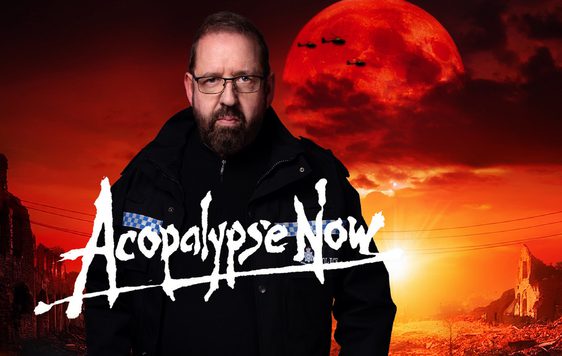 Alfie Moore in a police uniform in front of a red landscape with a large moon.