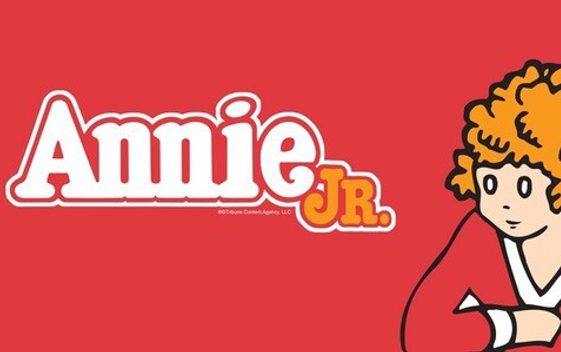 A red background with a cartoon doodle of a young girl with ginger hair and the show title "Annie Jr."