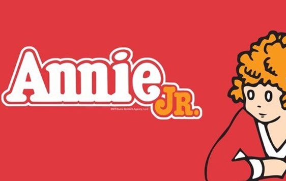 A red background with a cartoon doodle of a young girl with ginger hair and the show title "Annie Jr."