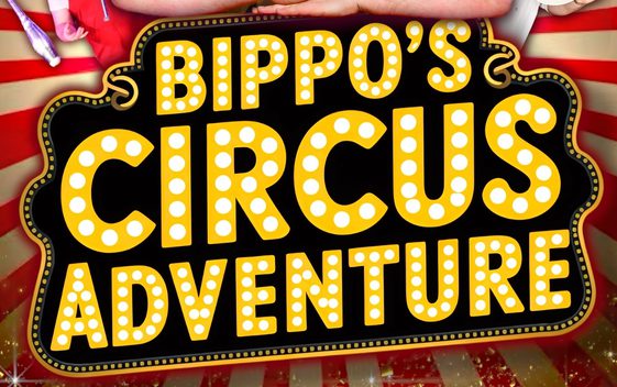 The words "Bippo's Circus Adventure" written in circus lights.