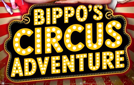 The words "Bippo's Circus Adventure" written in circus lights.
