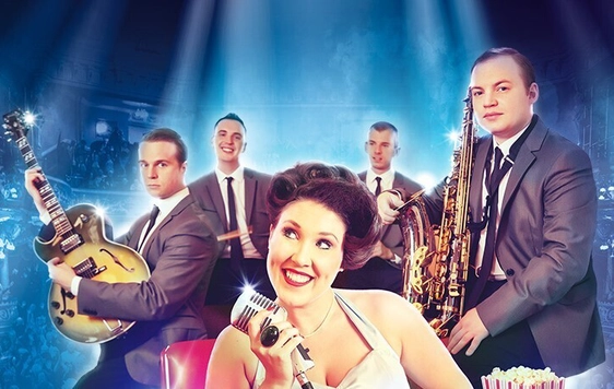 The cast members of Lipstick On Your Collar are showin in costume, posing with their instruments against a blue lit background