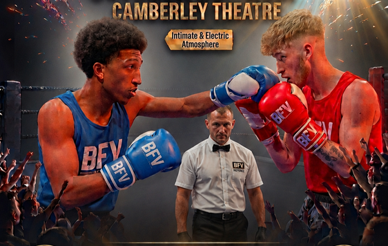 Two boxers are shown in the ring, one wearing blue and one wearing red with a referee behind them wearing a white shirt.