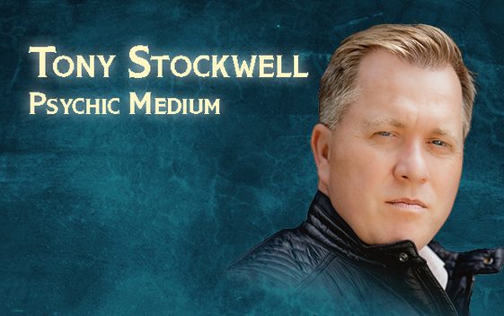 Tony Stockwell, wearing a leather jacket, is shown against a dark blue background