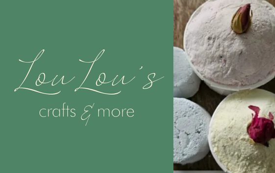 A collection of handmade bathbombs on a wooden surface.