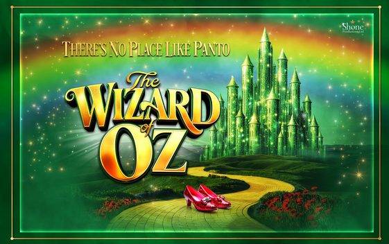 The show title "the Wizard of Oz" written in gold set against a green sparkling background showing a yellow brick road and a green castle. A pair of red shoes are on the yellow brick road.