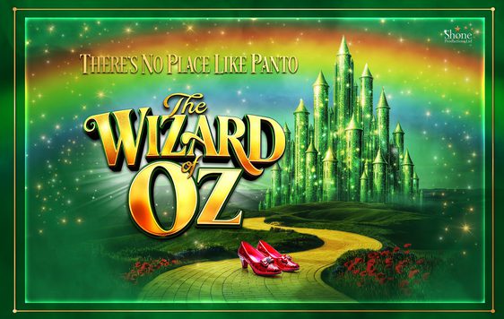 The show title "the Wizard of Oz" written in gold set against a green sparkling background showing a yellow brick road and a green castle. A pair of red shoes are on the yellow brick road.